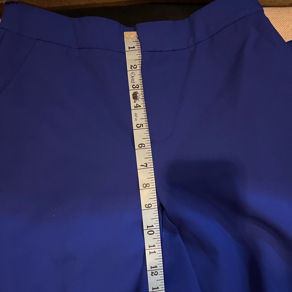 This is a blue suit comes with blazer and pants. It is an XS. - Picture 9 of 10